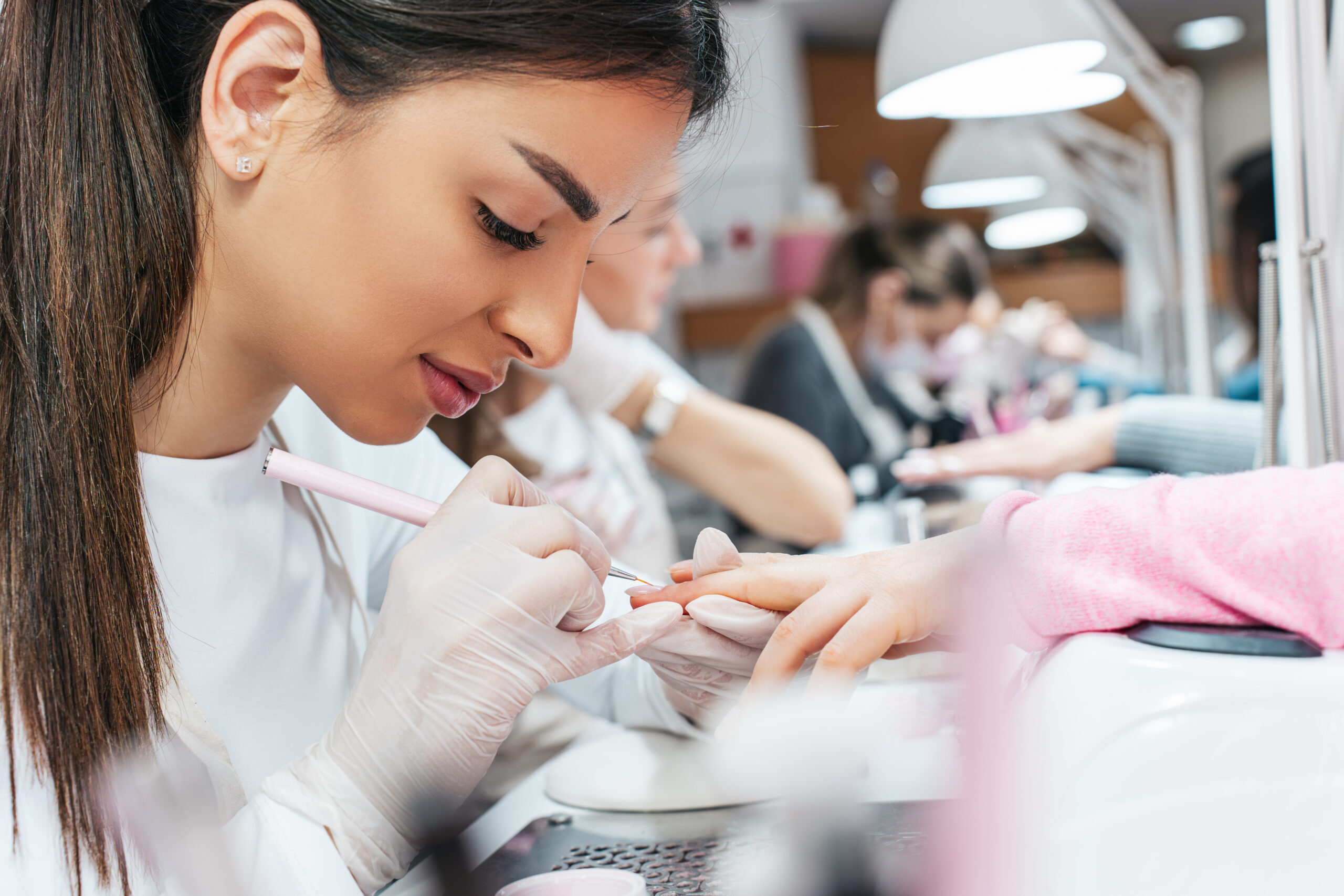 woman giving manicure