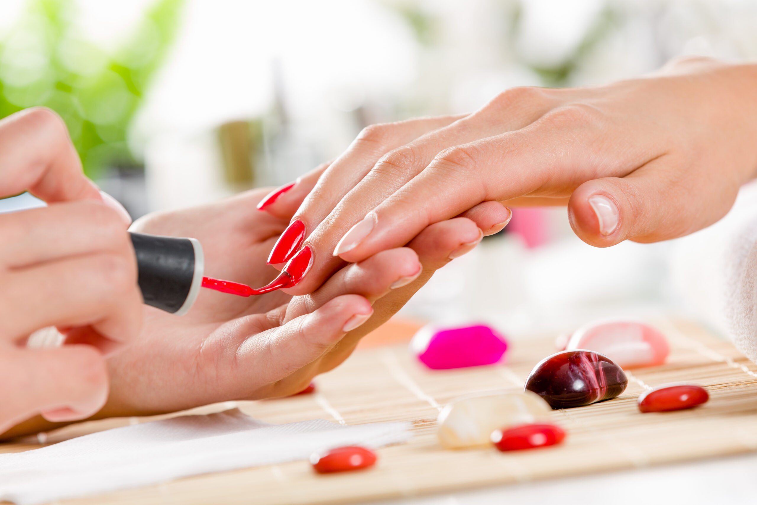 woman giving manicure