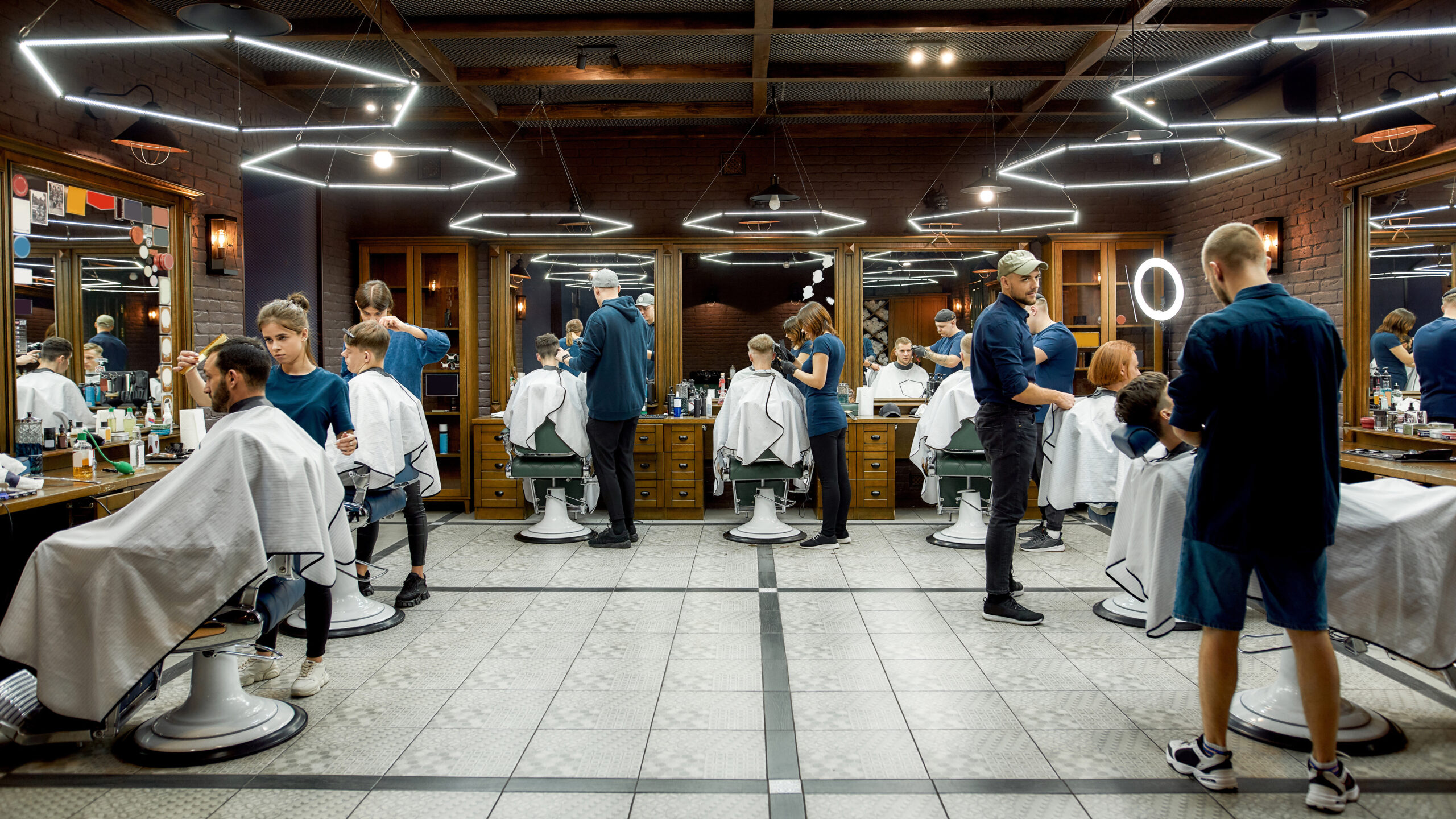 barbers working on clients